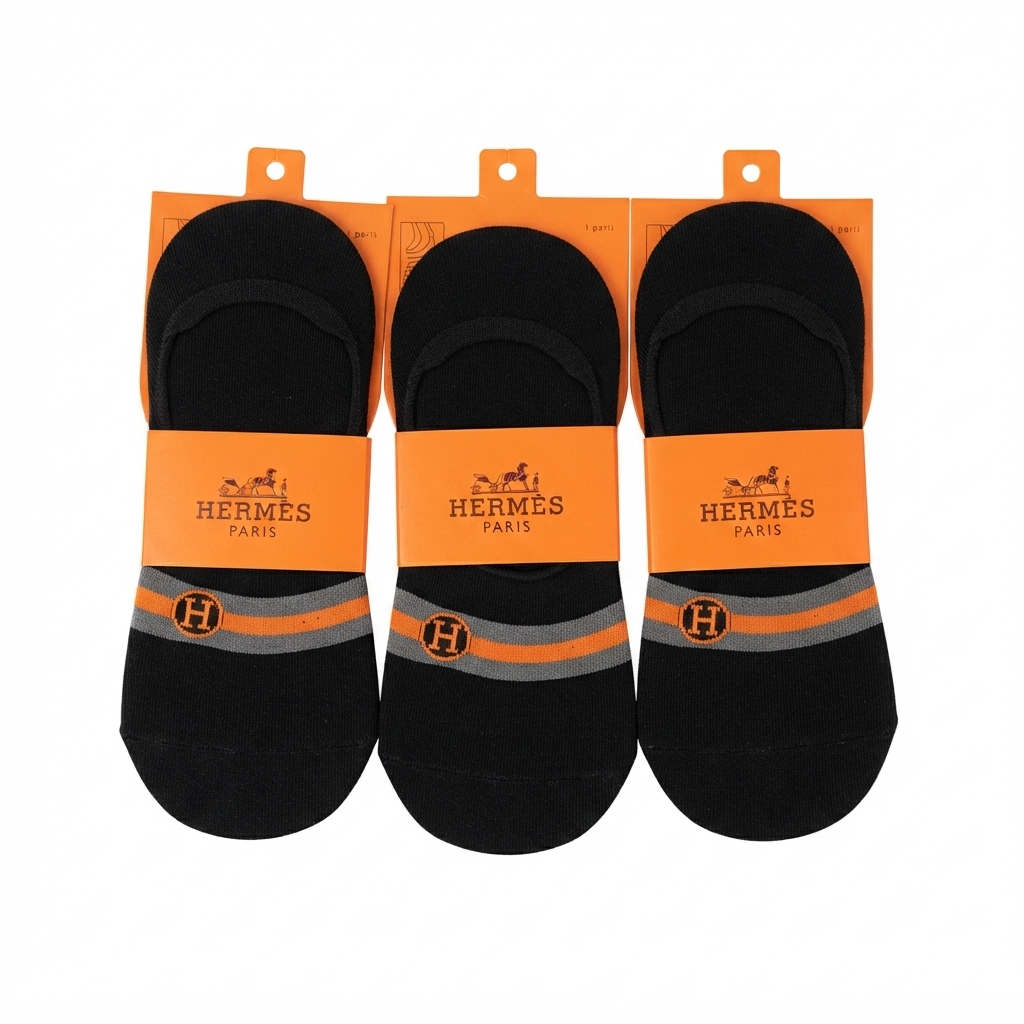 Hermès "H" embroidered orange band